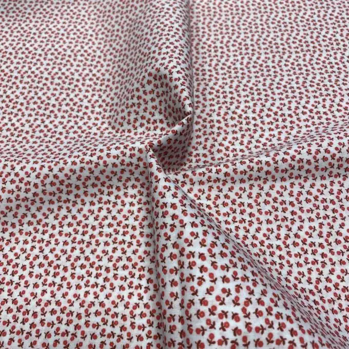 Tessuto voile di cotone morbido bianco mini fiori rossi