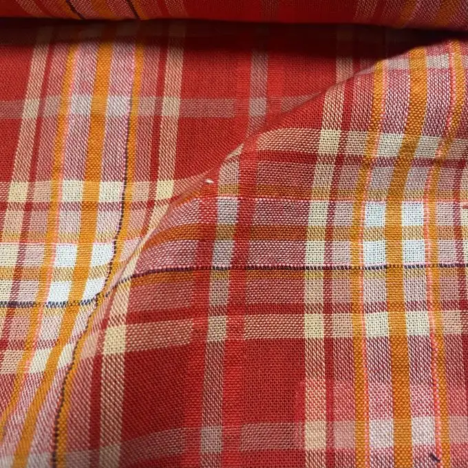 Tessuto di cotone leggero a righe rosse e arancioni