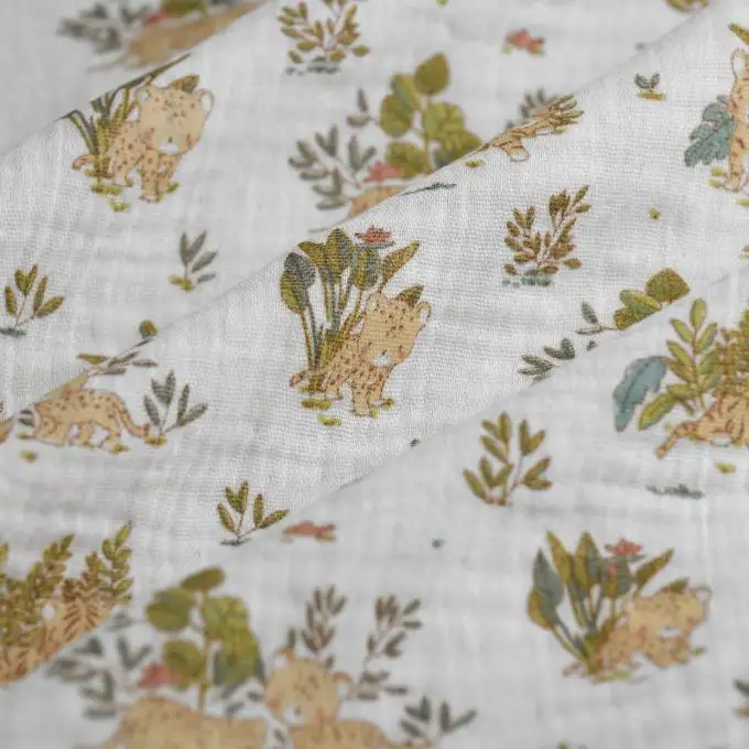 Tessuto doppio garza neonato tigre ecru