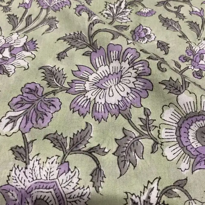 Tessuto voile di cotone stampa block print fiore verde mandorla
