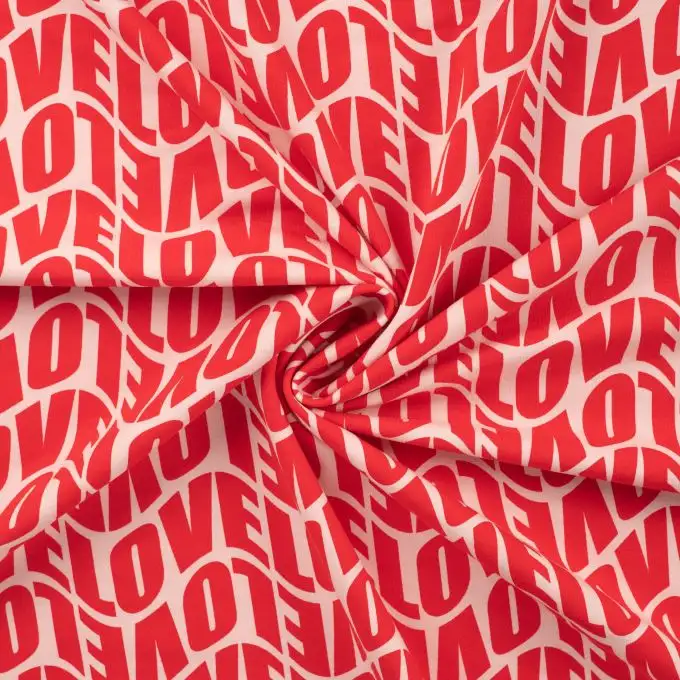 Tessuto french terry stampato love rosso rosa