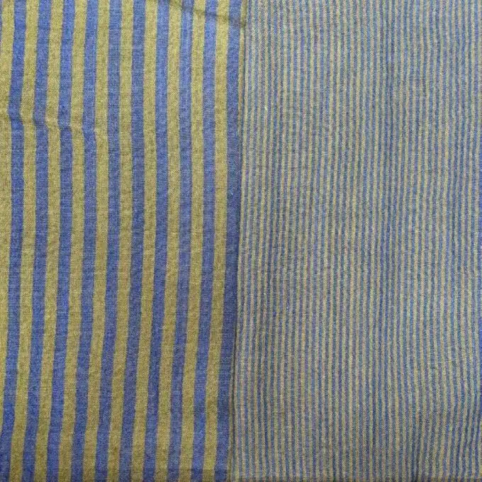 Tessuto doppio garza striscia bronzo e cobalto