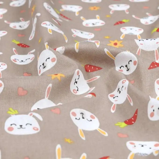Tessuto cotone 52 fili stampato con coniglietto naturale