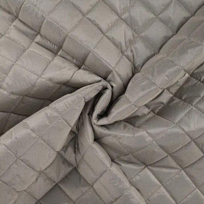 Tessuto trapuntato stampato piccolo cuore beige