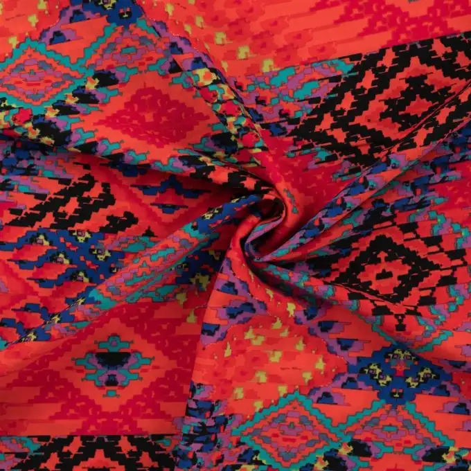 Tessuto voile cotone stampato rombi effetto arazzo rosso