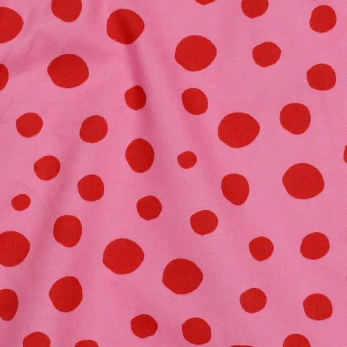Tessuto popeline cotone pois irregolari rosso rosa