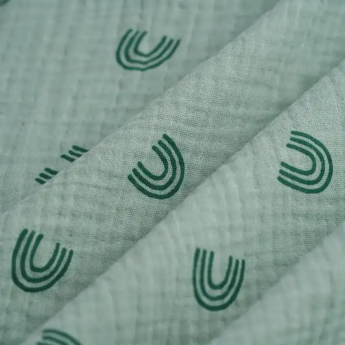 Tessuto doppio gaze arcobaleno verde salvia