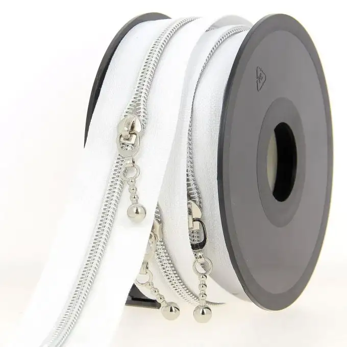 Chiusura lampo al metro bianco e argento + cursore