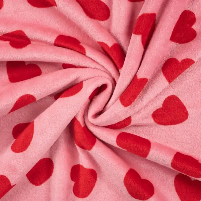 Tessuto Douillette stampato cuore rosa