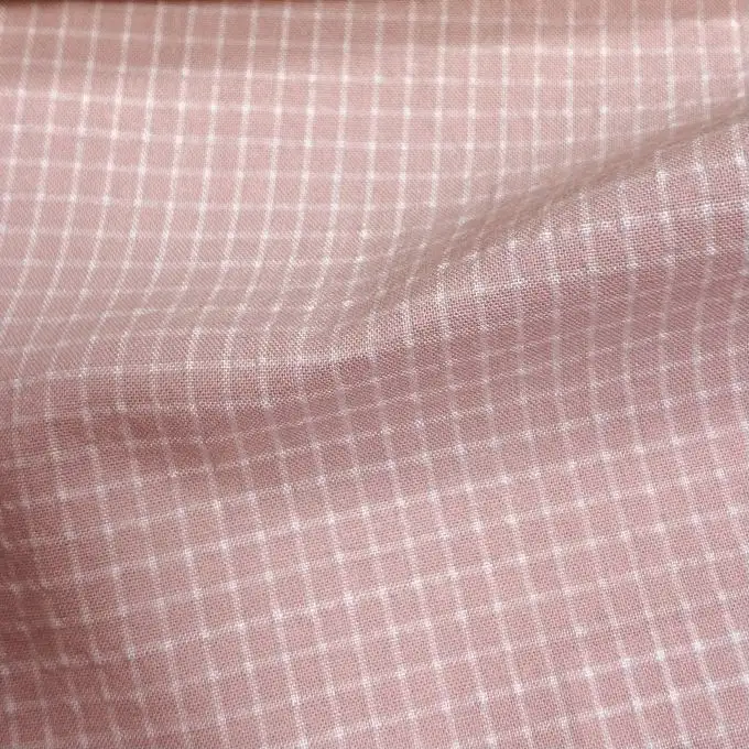 Tessuto cotone poliestere piccoli quadretti rosa chiaro