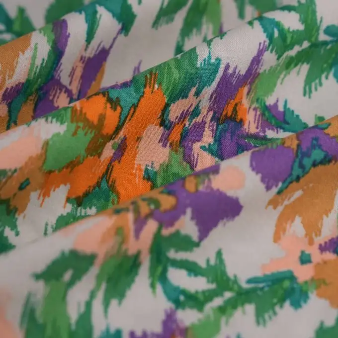 Tessuto popeline viscosa ikat floreale multicolore