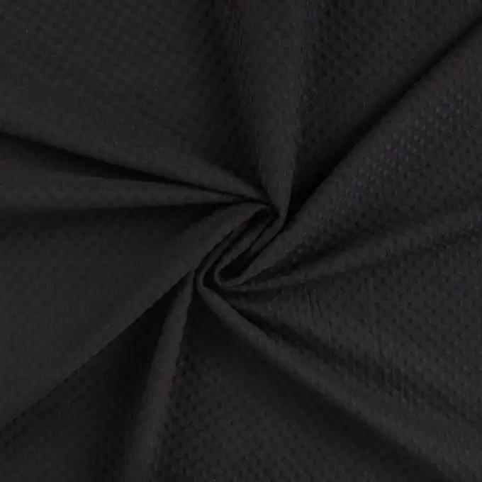 Tessuto ricamo inglese cotone mini alveolo pois nero