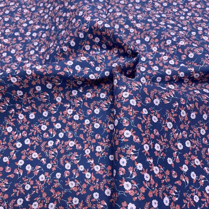 Tessuto voile di cotone morbido blu rami fioriti rossi