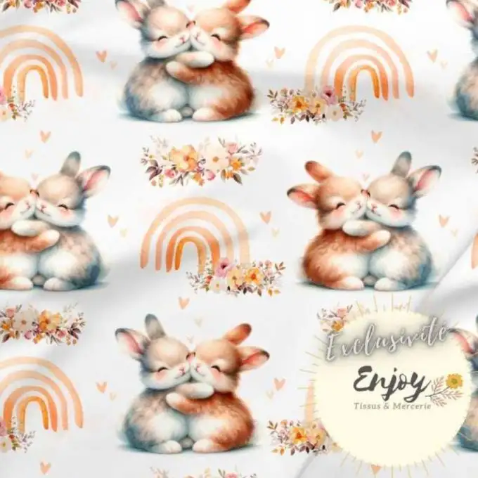 Tessuto Jersey Animali Coniglio Arcobaleno beige venduto al metro