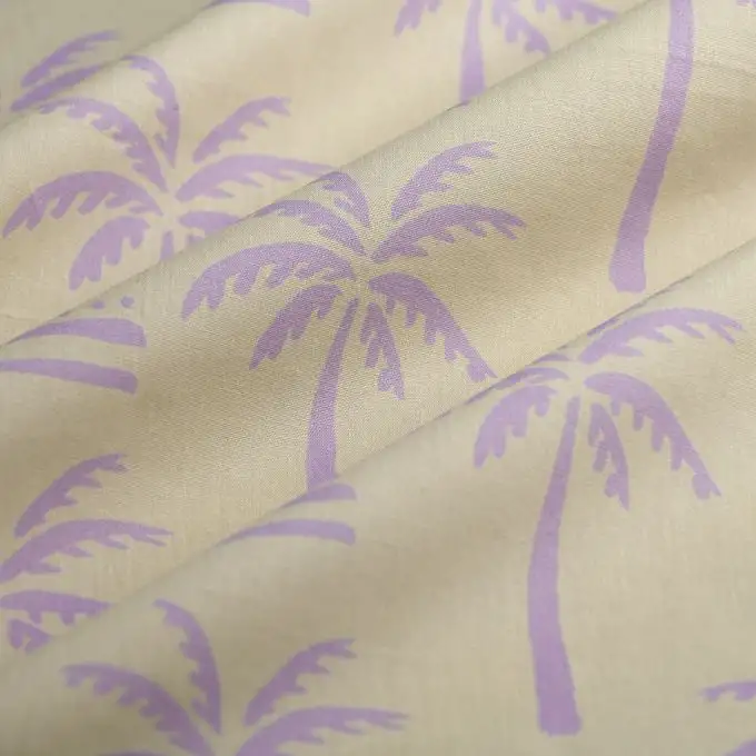 Tessuto popeline cotone palma lilla ecru