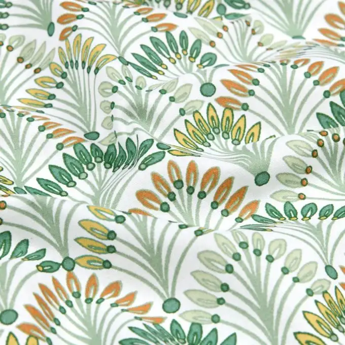 Tessuto cretonne stampato geometrico verde coda di pavone