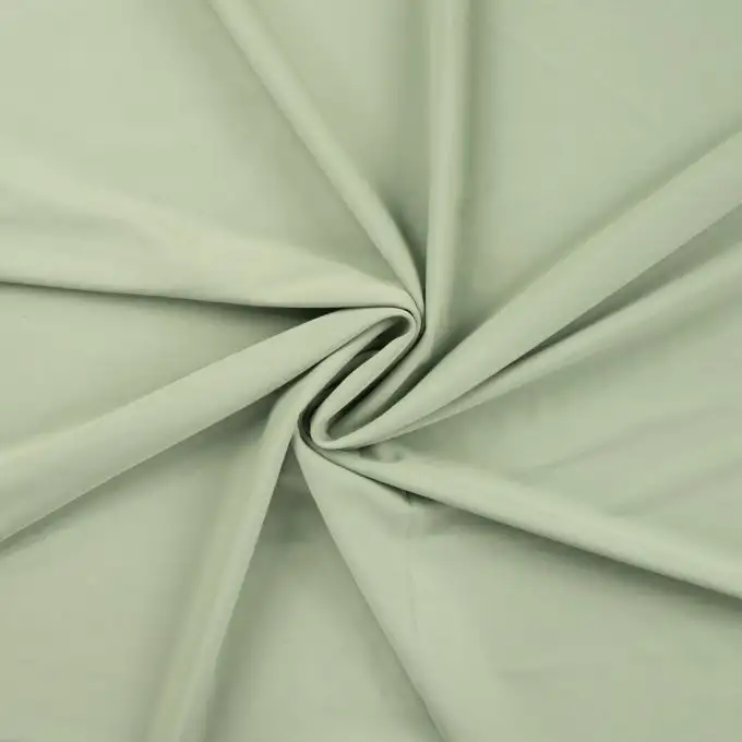 Tessuto tecnico sport verde mandorla