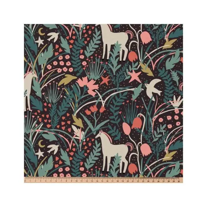 Tessuto cotone bambino unicorno su sfondo nero