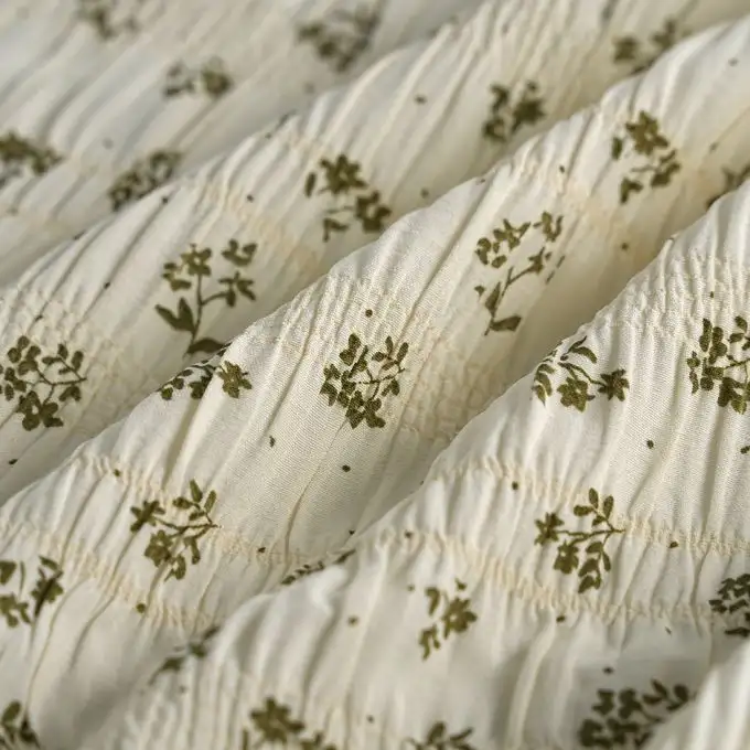 Tessuto popeline viscosa poliestere elastan effetto smock bouquet ecru