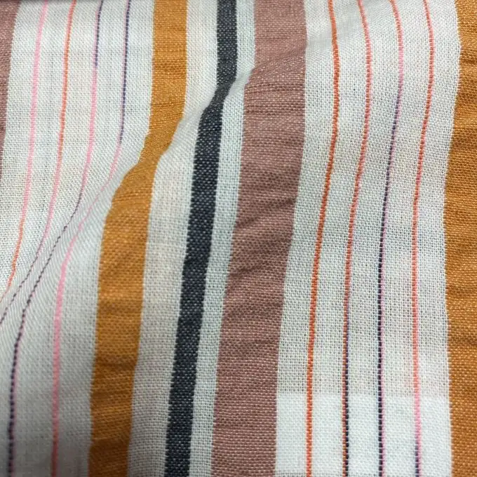 Tessuto di cotone leggero a righe grigie e arancioni