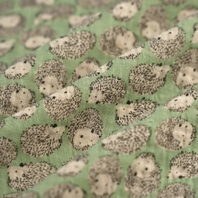 Tessuto doppia garza riccio giada