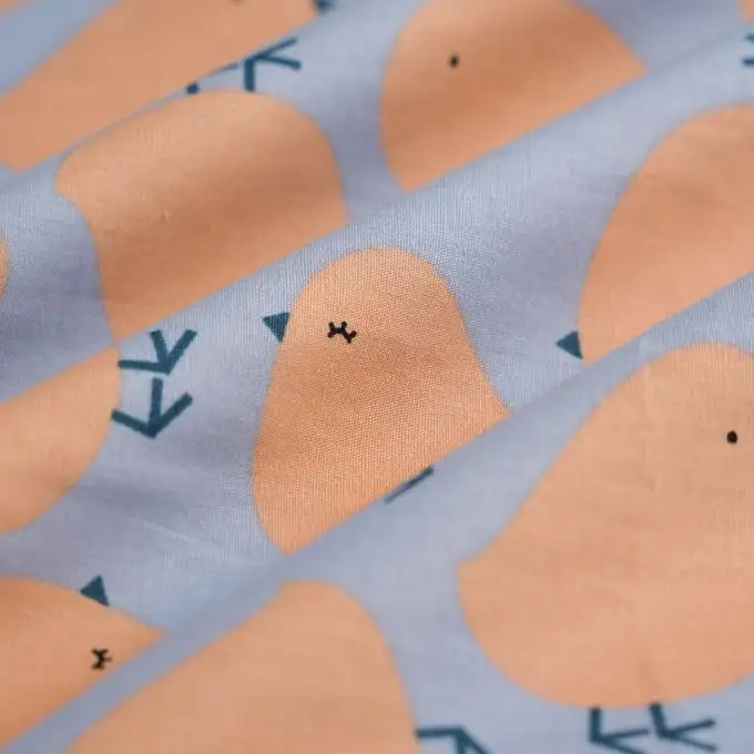 Tessuto popeline cotone pulcini beige blu