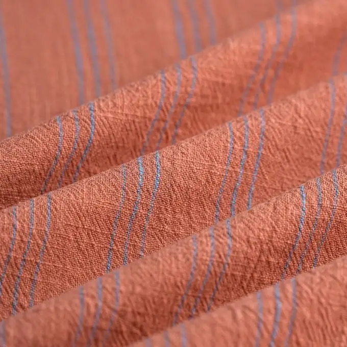 Tessuto crepe cotone slub fine righe blu terracotta
