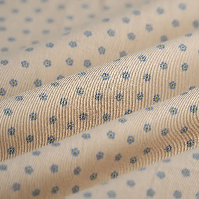 Tessuto cotone mini margherite blu ecru