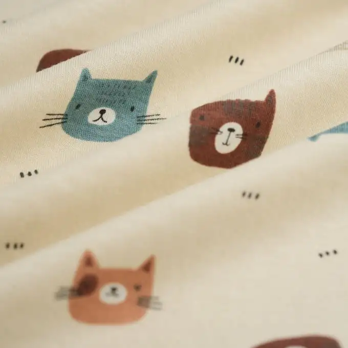 Tessuto jersey cotone teste di gatto beige