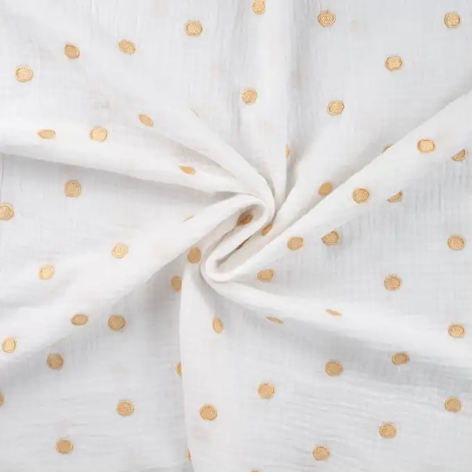 Tessuto in doppia garza ricamato oro pois ecru