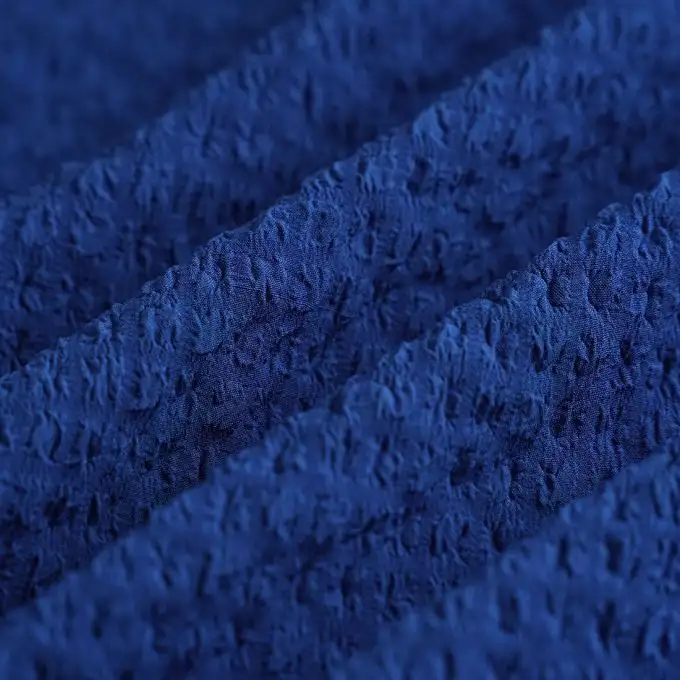 Tessuto voile poliestere elastan goffrato unito blu