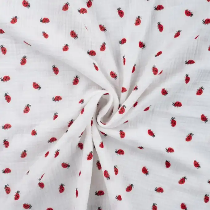 Tessuto doppio garza stampato coccinella bianco