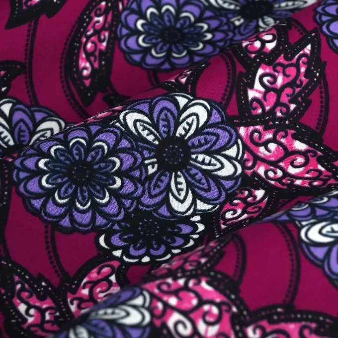 Tessuto wax floreale rotondo viola