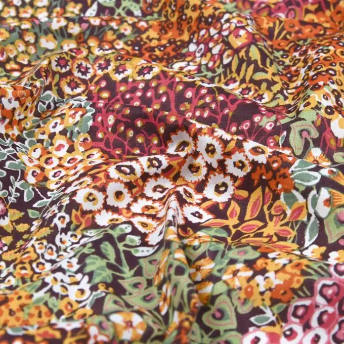 Tessuto cretonne stampato giardino fiorito arancione