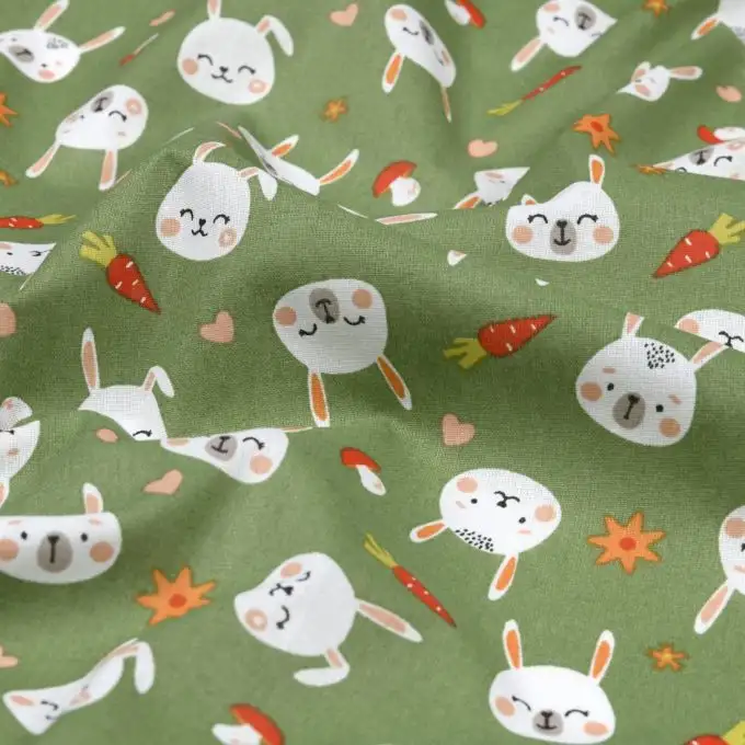 Tessuto cotone 52 fili stampato con coniglietto verde