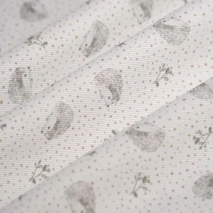 Tessuto di cotone ricamato riccio taupe