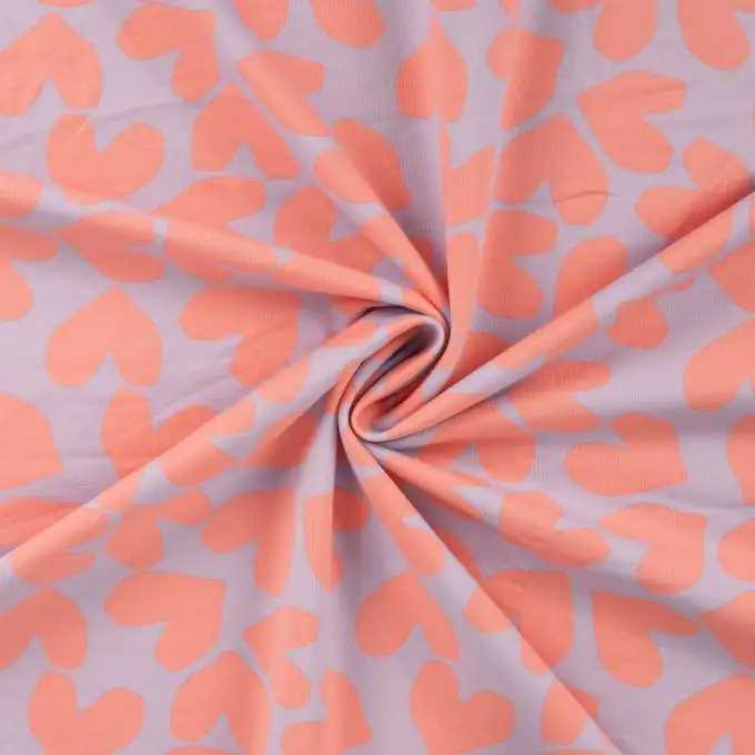 Tessuto french terry stampato cuori a gogo giallo blu