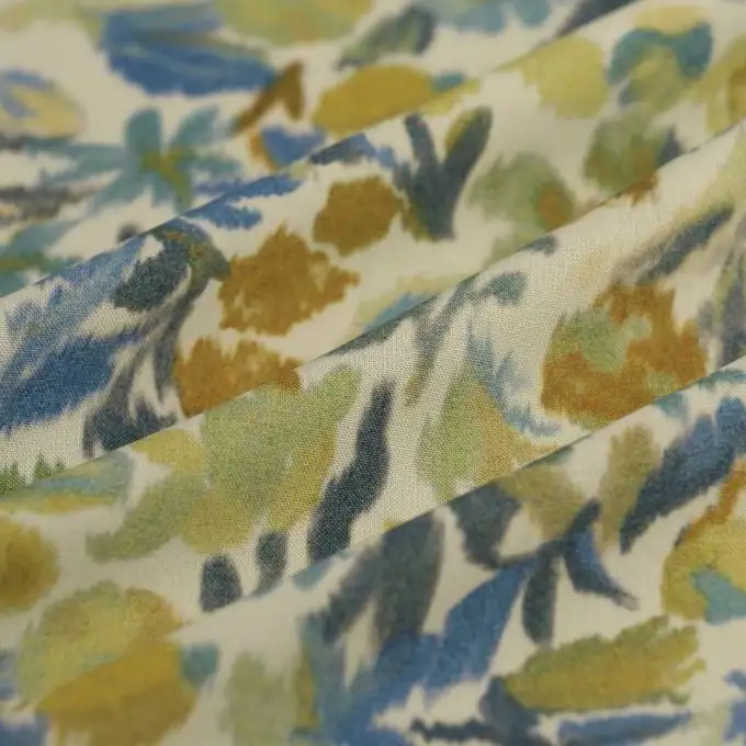 Tessuto popeline viscosa fiore Ikat verde