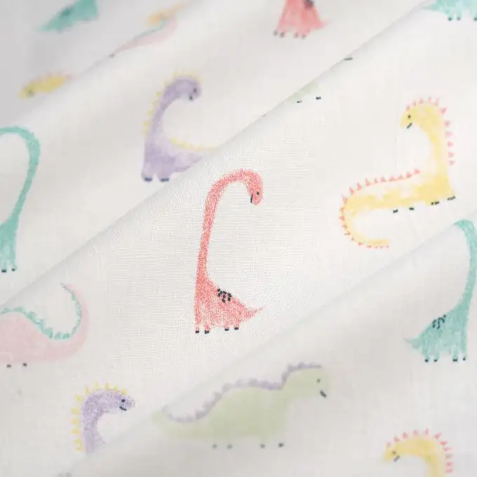 Tessuto cretonne dinosauro colore