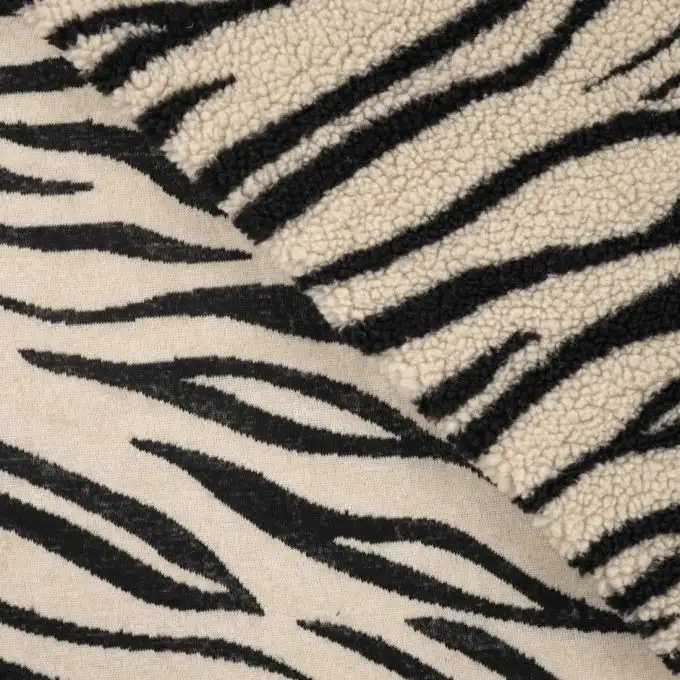 Tessuto bouclé stampato zebra nero e bianco